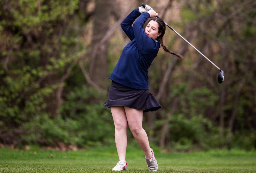 Poly Prep Golf team Athlete swings the golf club